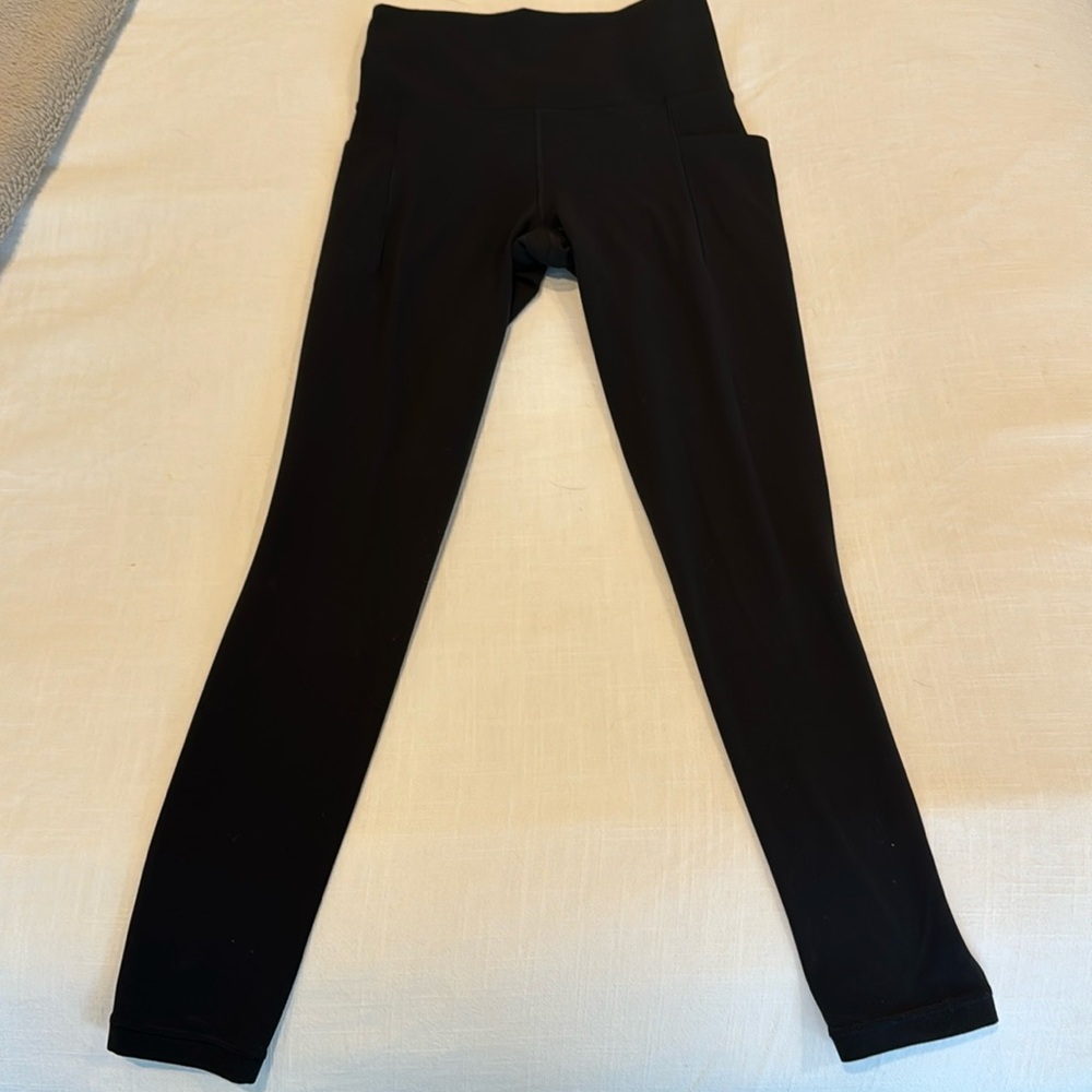 Athleta salutation stash pocket tight